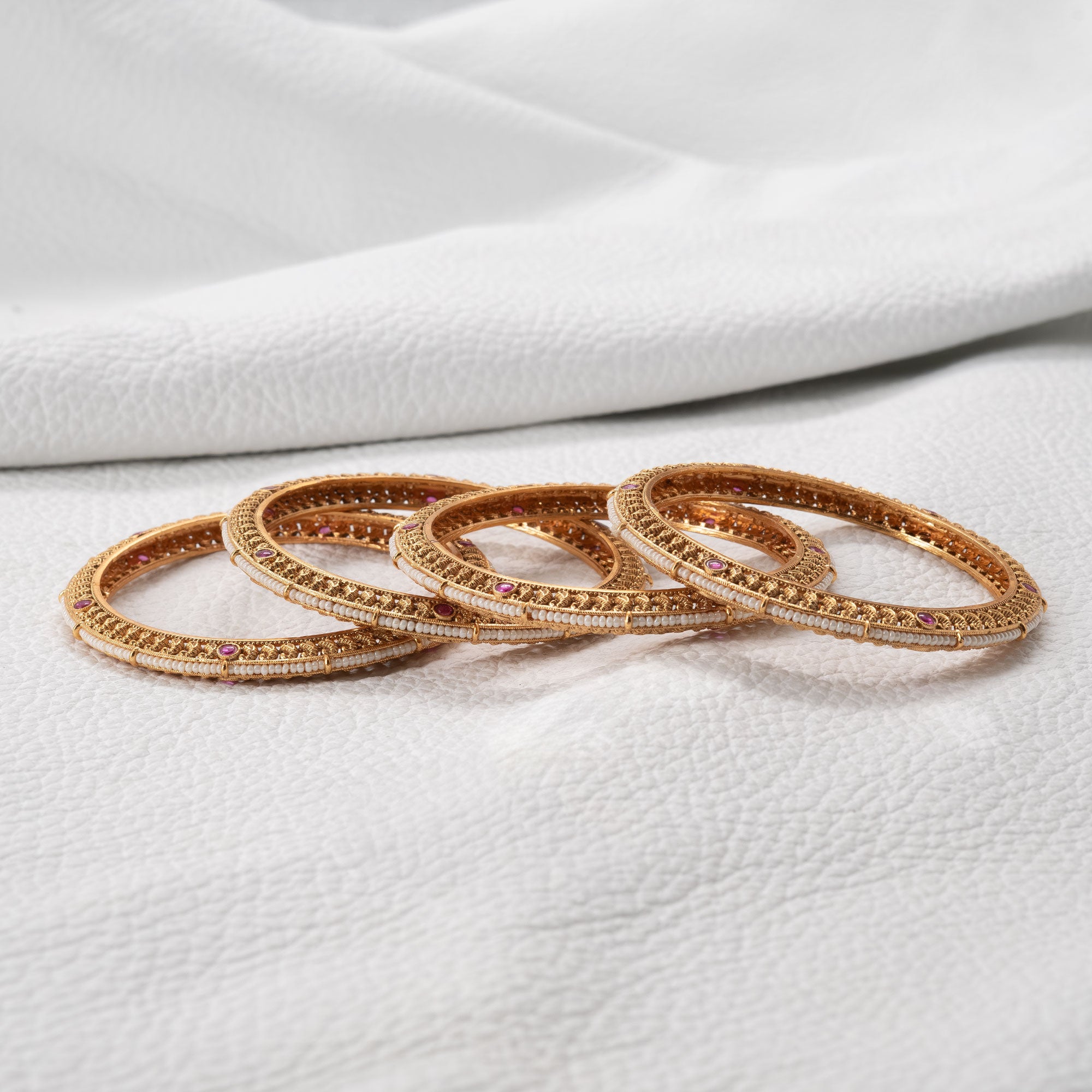 Trendy Flat Bangles with Pearls in Center (Set of 4)