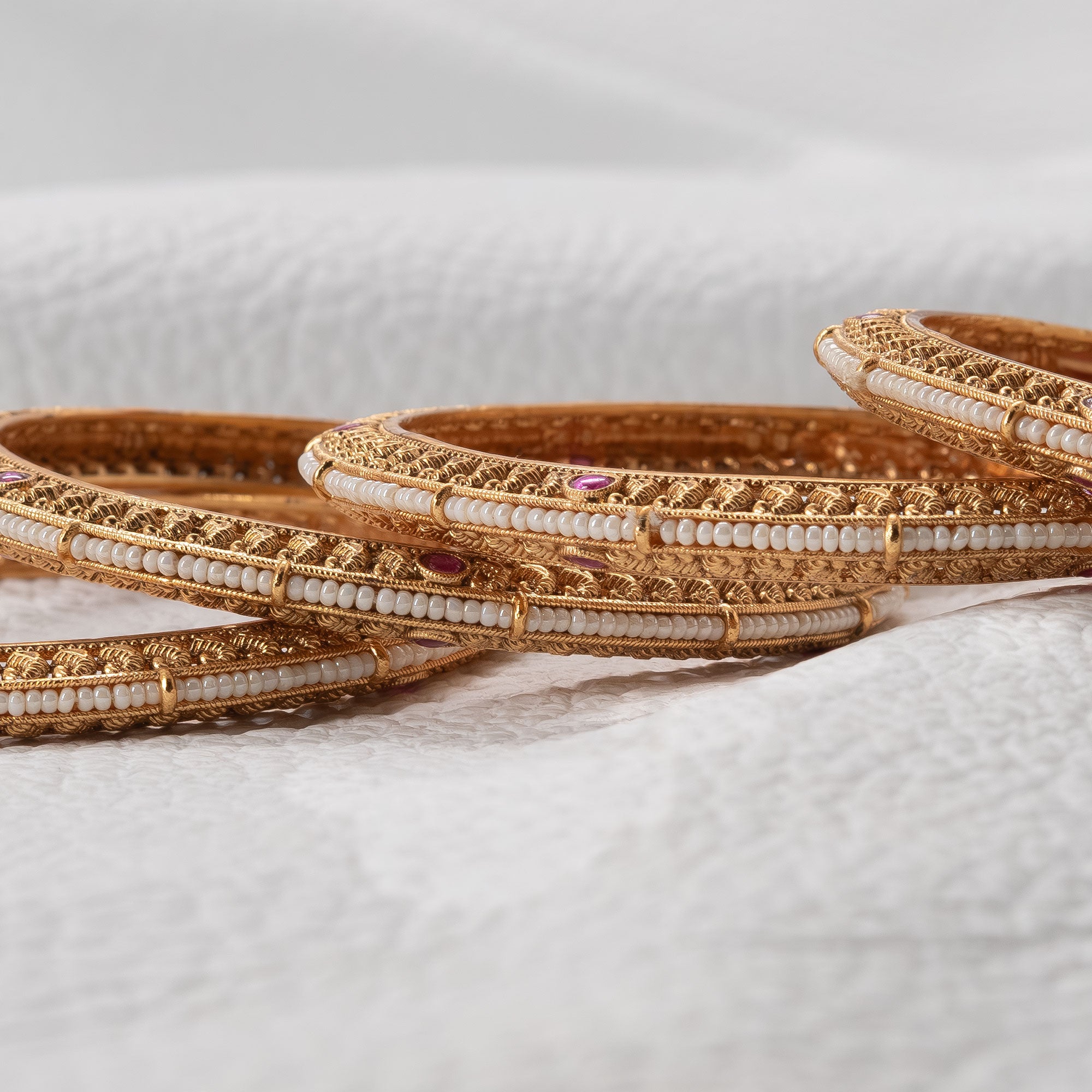 Trendy Flat Bangles with Pearls in Center (Set of 4)